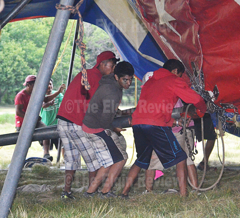 circustentraising2015_4777 The tent gets raised. Elgin Review