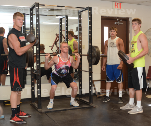wolfpack-weightlifters_2777 Wolfpack football team members have spent the summer in the weight room. Here are team captains (l-r) Dylan Behnk, Andrew Fangman, Seth Schumacher and Kyle Kallhoff. The Elgin Review.
