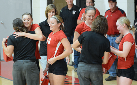 senior-night_9561 Seniors (l-r) Jill Schindler, Jenna Parks, Terri Seier and Nicole Beckman recognzied by the EPPJ Wolfpack coaches before Tuesday night's varsity game. Head coach is Tina Thiele-Blecher (l, back to camera), asst coach Emily Borer (c, background) and asst. coach Sandi Henn (r, back to camera). E-R photo