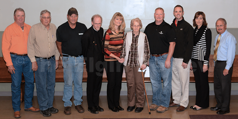 trustpresentationselginreview_9807 Recipients and trustee of the Tunink Estate. Pictured l-r: Jerry Heithoff, LeRoy Kerkman, Gary Hoefer, Fr. Ross Burkhalter, Sandy Kester, Yvonne Heithoff, Todd Heithoff, Michael Moser, Martha Nelson and Jack Green. E-R photo