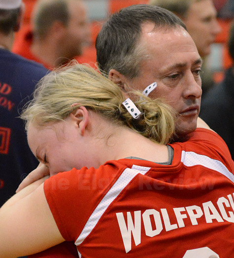 wolfpack-vb-vs-crofton_3311 Nicole Beckman looks to dad John for comfort following the loss.