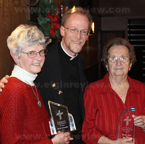img_5930-rosie-shirley-receive-award-2016 Now-retired St. Boniface Choir Director Rosie Schueths, Fr. Ross Burkhalter and now-retired organist Shirley Meis. Photo submitted