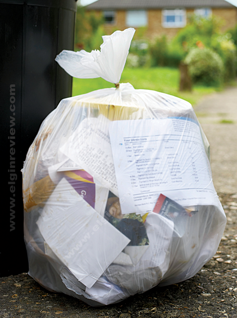 n1209p14007c Trash pickup in Elgin The Elgin Review