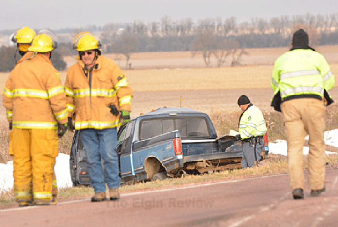 Antelope County Sheriff Bob Moore (with clipboard), the Nebraska State Patrol and members of Elgin Fire & Rescue were at the scene. E-R photo Antelope County Sheriff Bob Moore (with clipboard), the Nebraska State Patrol and members of Elgin Fire & Rescue were at the scene. E-R photo